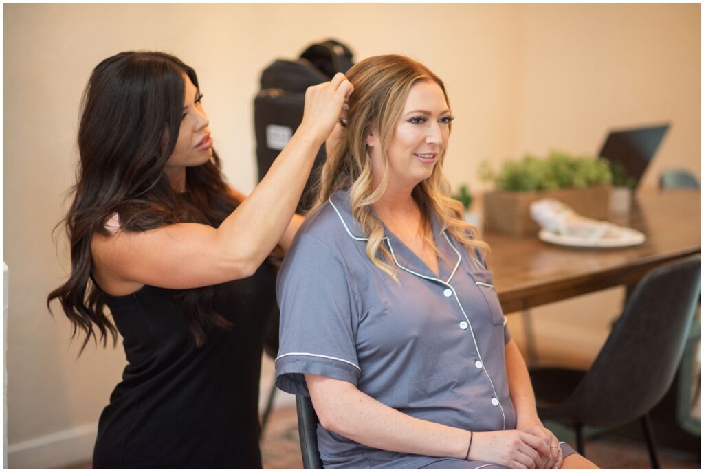 Bride getting hair done by Her Hairdresser