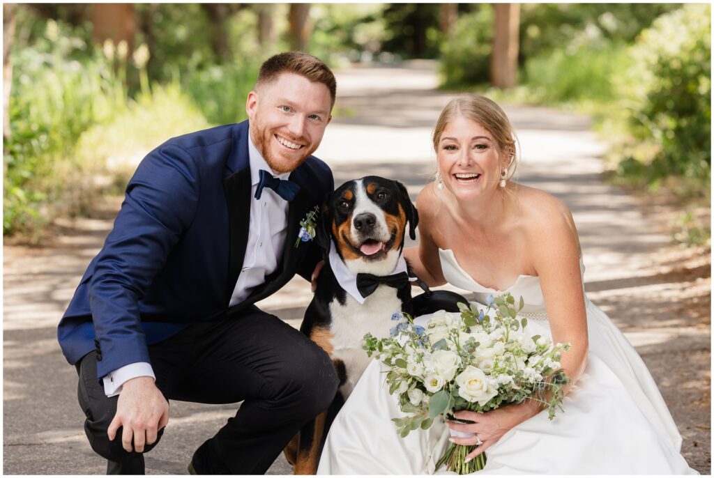 Bride and groom with their dog before ceremony
