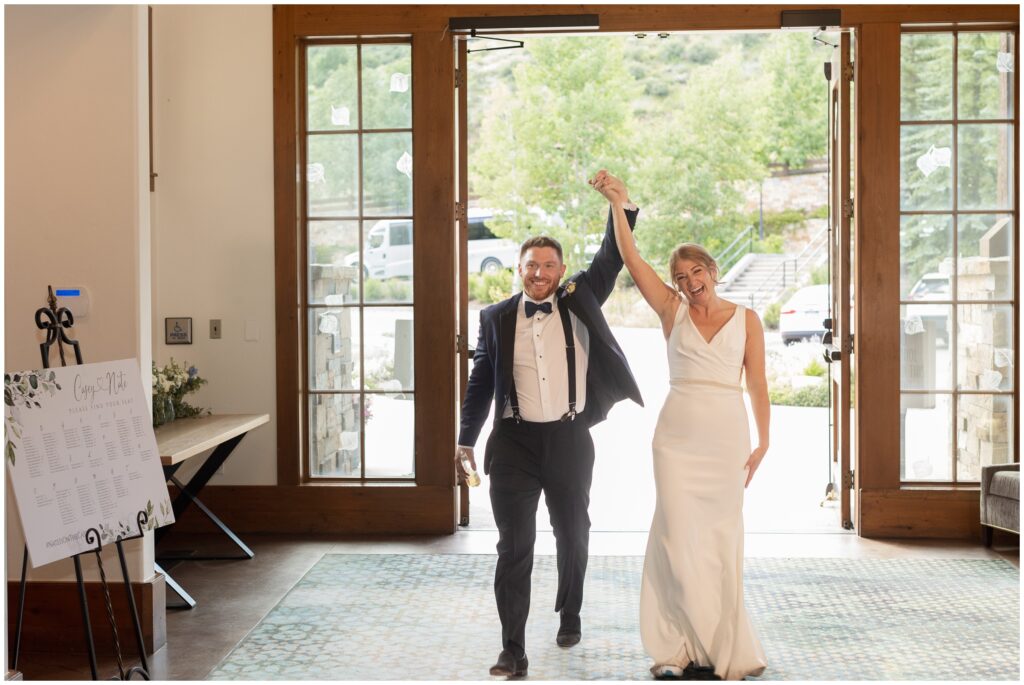 Bride and groom grand entrance at Donovan Pavilion 