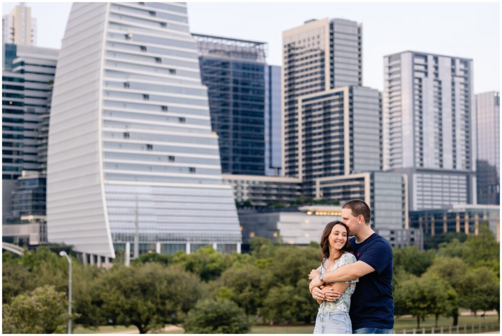Couple hugging Downtown during Austin Engagement session
