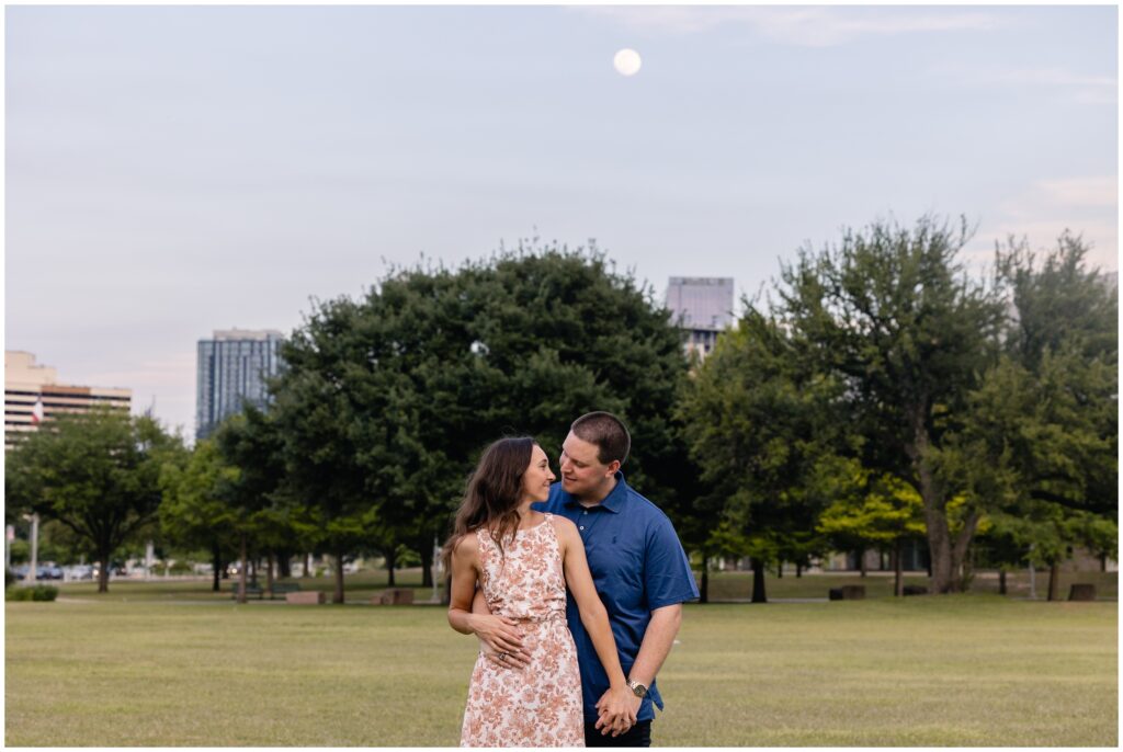 Moon over couple during Austin engagement session