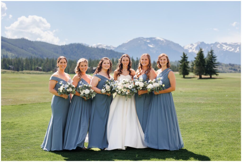 Bride with Bridesmaids outside in Keystone