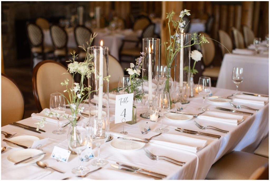Floral decor at reception dinner table by Garden of Eden Flowers and Gifts