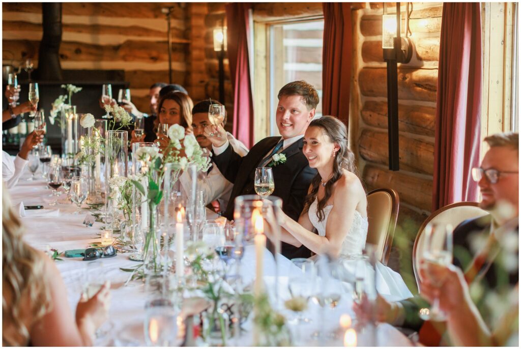 Bride and groom toasting at Keystone Ranch