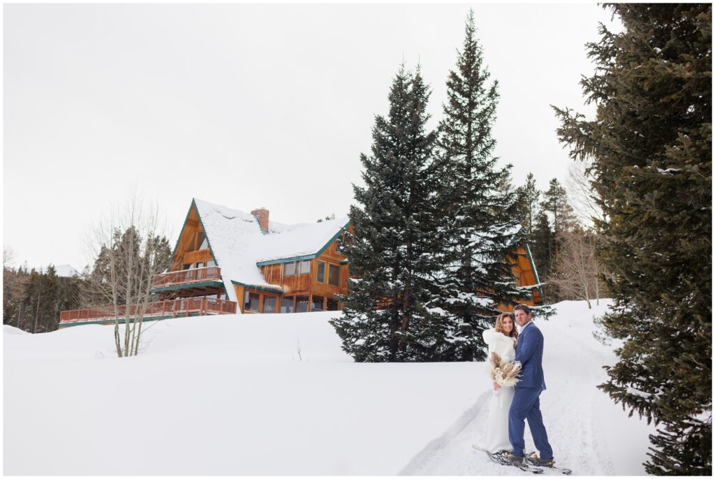 bride and groom outside High Country Lodge Breckenridge