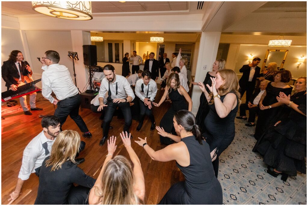 Bridal party dancing during reception at Woodstock Inn in Vermont