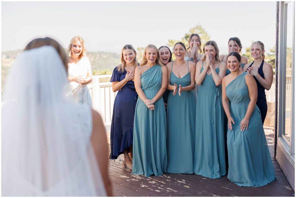 Bride first look with bridesmaids
