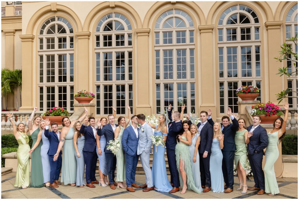 Wedding party outside entrance of Ritz Carlton in Naples