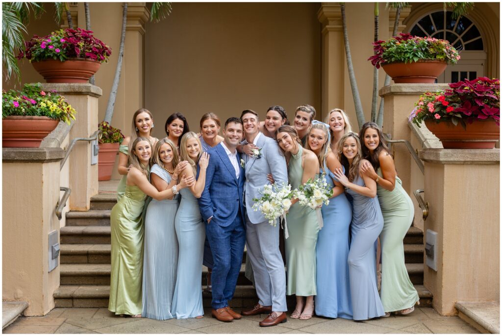 Bridesmaids with grooms outside at Ritz Carlton in Naples