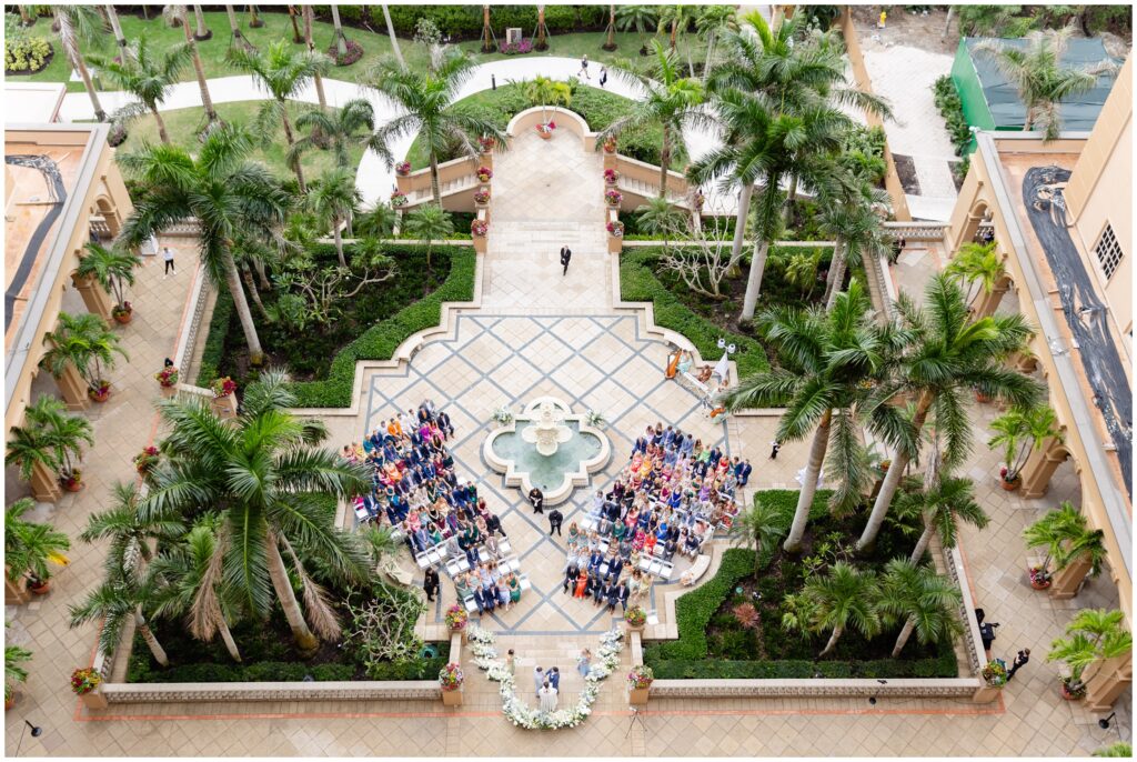 Ariel view of guests seated for wedding ceremony at Ritz Carlton in Naples