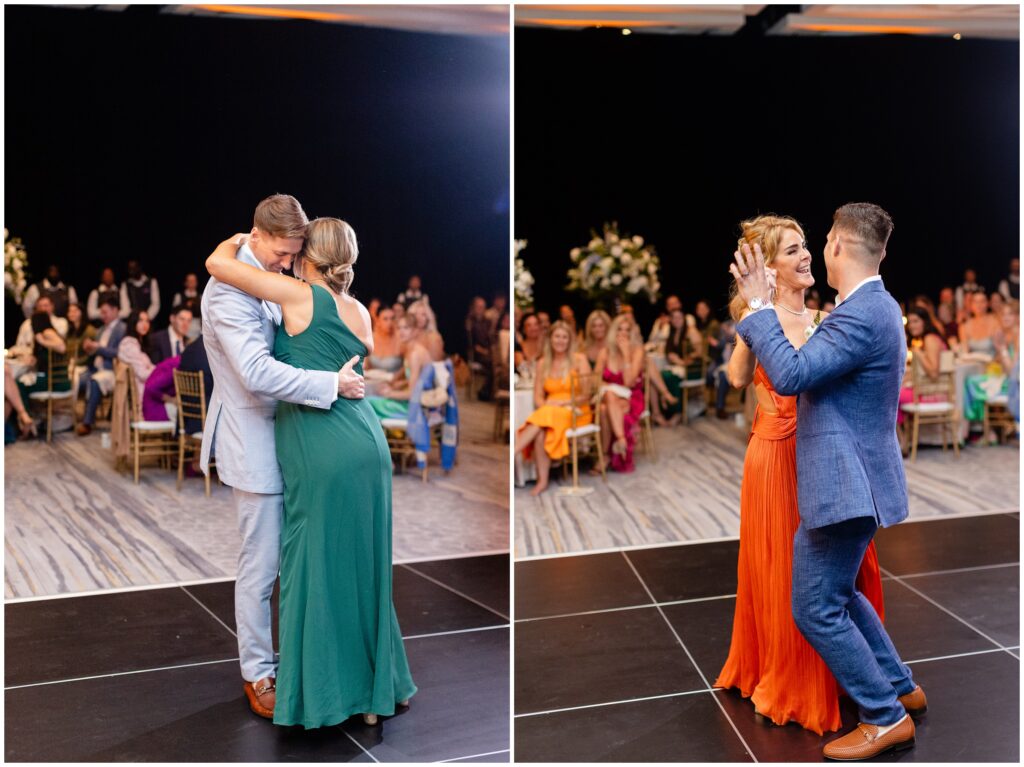 Grooms dancing on floor with guests