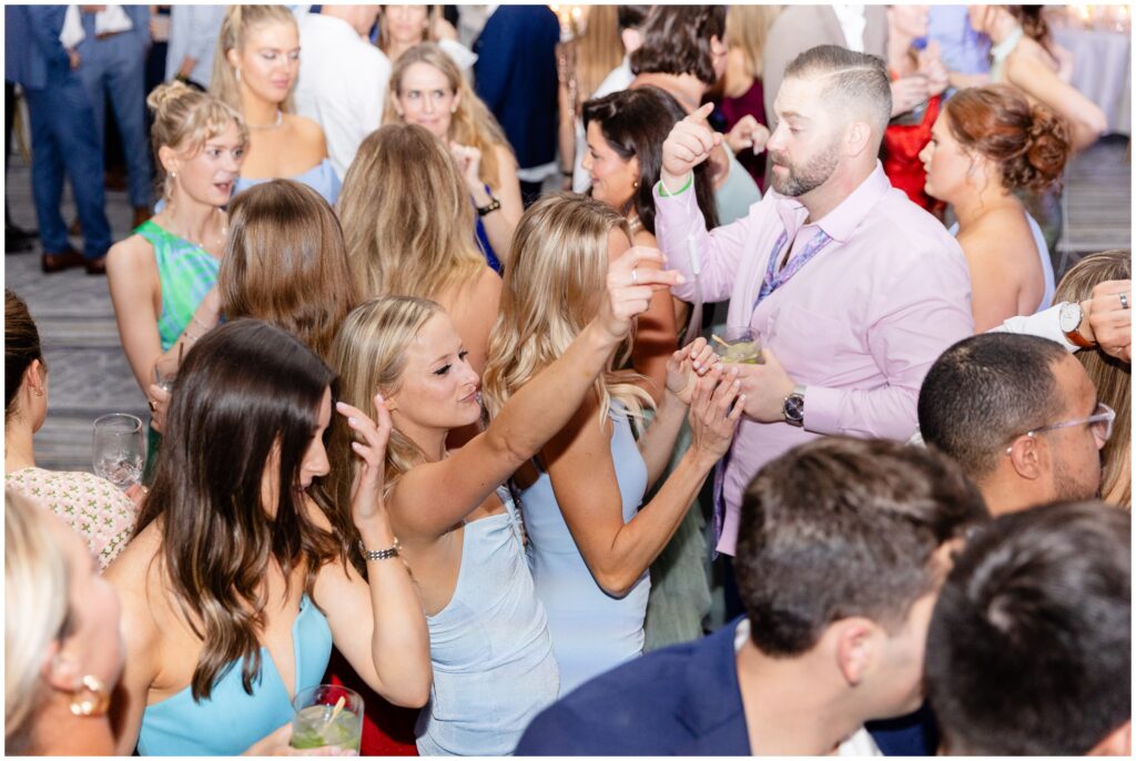 Wedding guests on dance floor  during wedding reception at Ritz Carlton in Naples