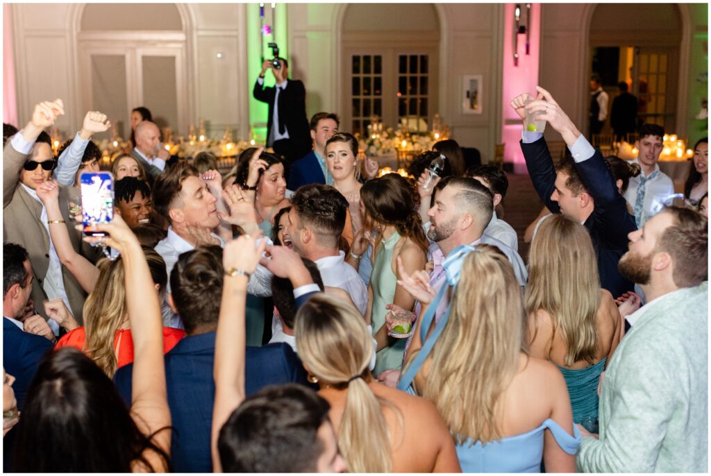 Wedding guests on dance floor  during wedding reception at Ritz Carlton in Naples