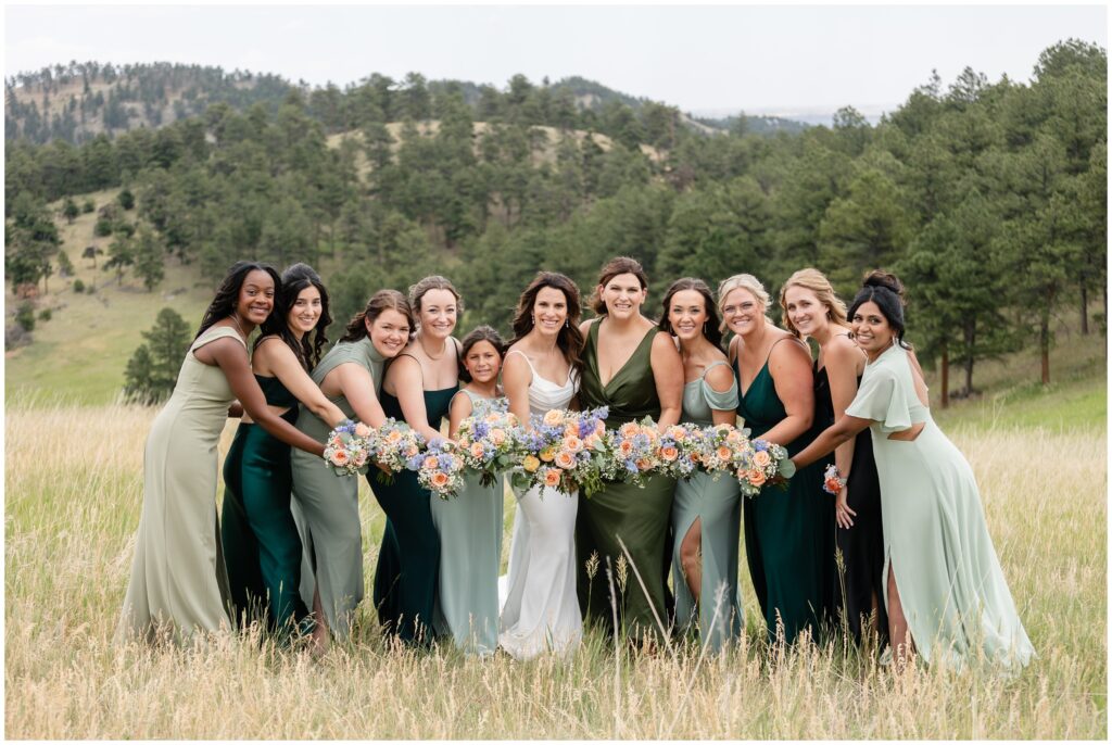 Bride with bridesmaids outside of Boulder Creek by Wedgewood