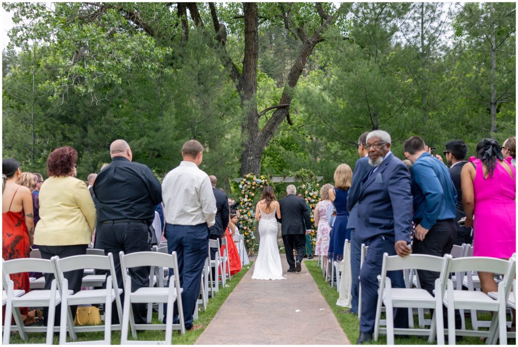 Father of bride and bride walking down isle for ceremony at Boulder Creek by Wedgewood