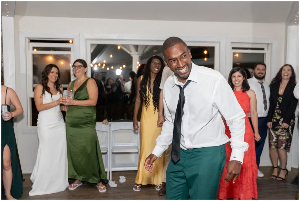 Groom dancing with guests at Boulder Creek by Wedgewood