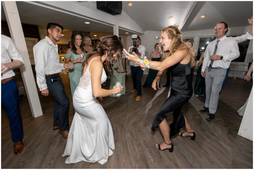 Bride dancing with guests at Boulder Creek by Wedgewood