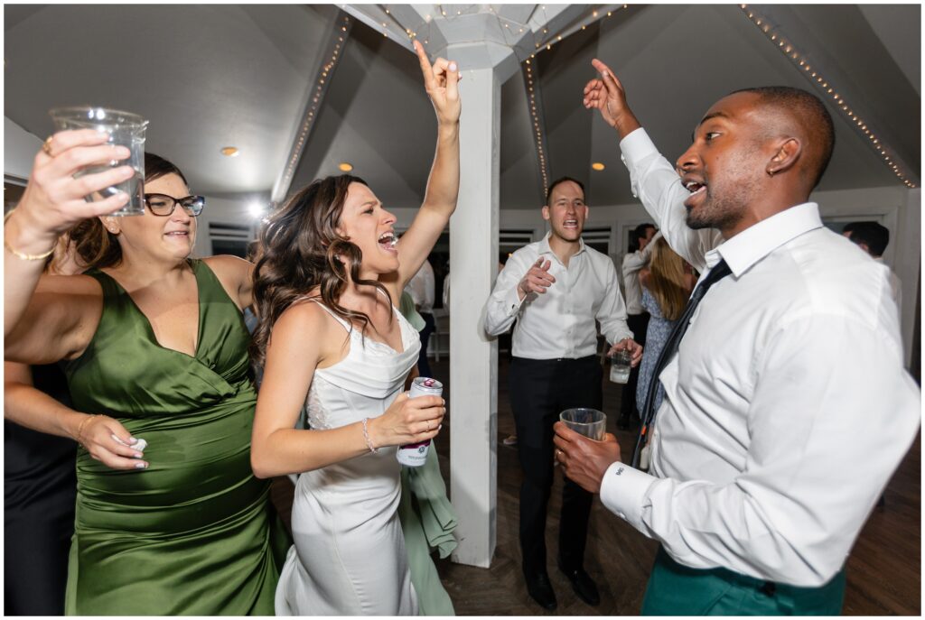 Bride and groom dancing with guests at Boulder Creek by Wedgewood