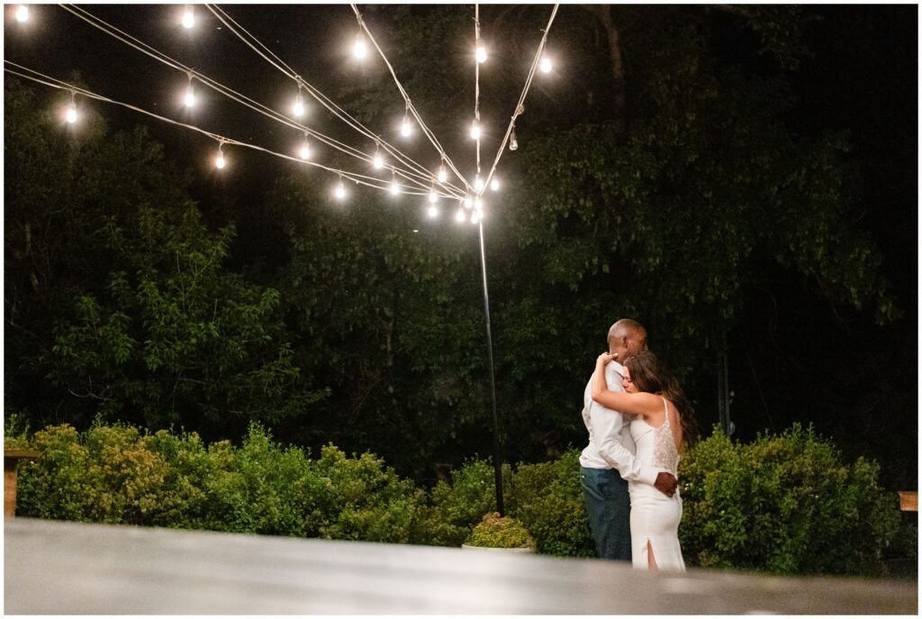 Bride and groom slow dance outside at Boulder Creek by Wedgewood