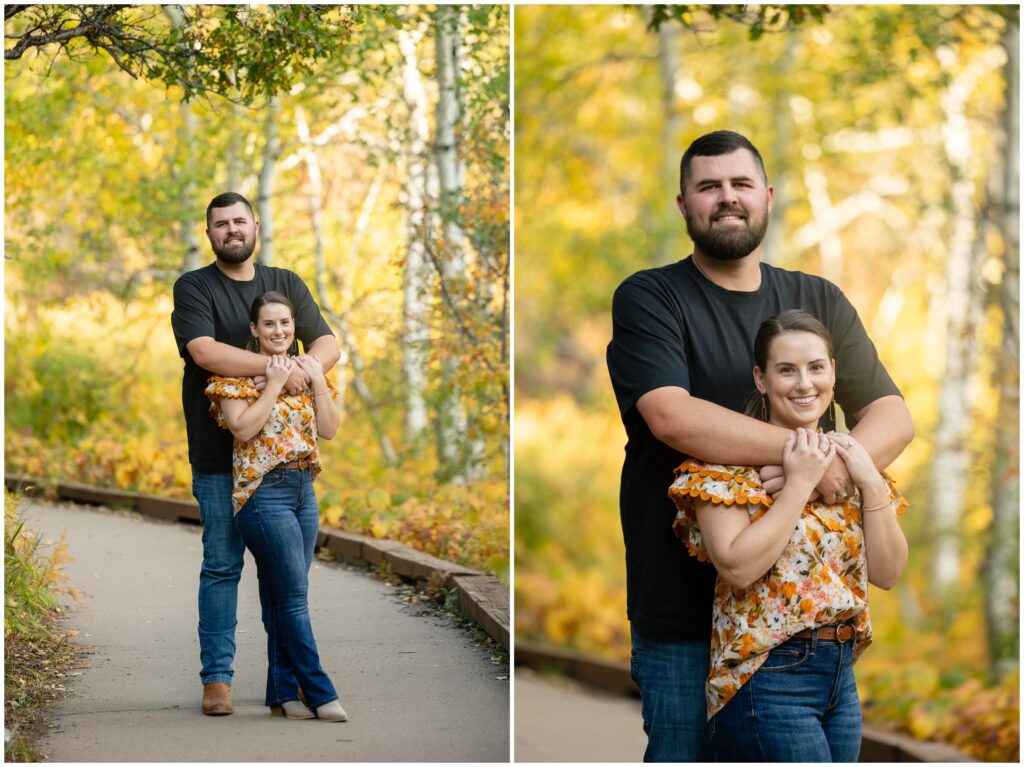 Couple standing on trail during Engagement session in Fish Creek Falls Steamboat Springs