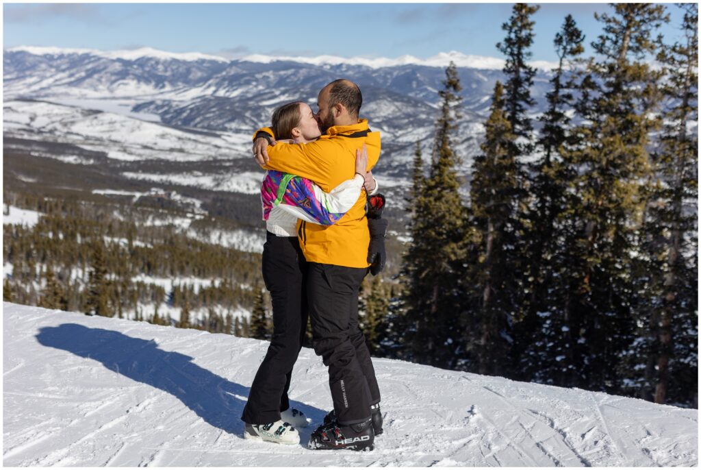 Couple hug during Breckenridge mountain proposal