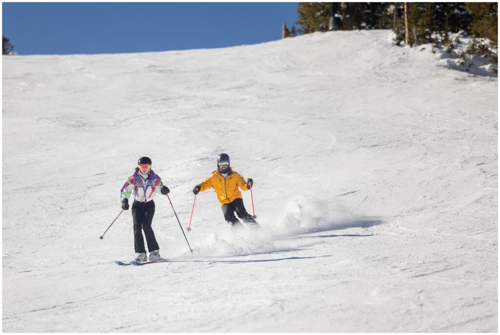 Couple ski Breckenridge mountain