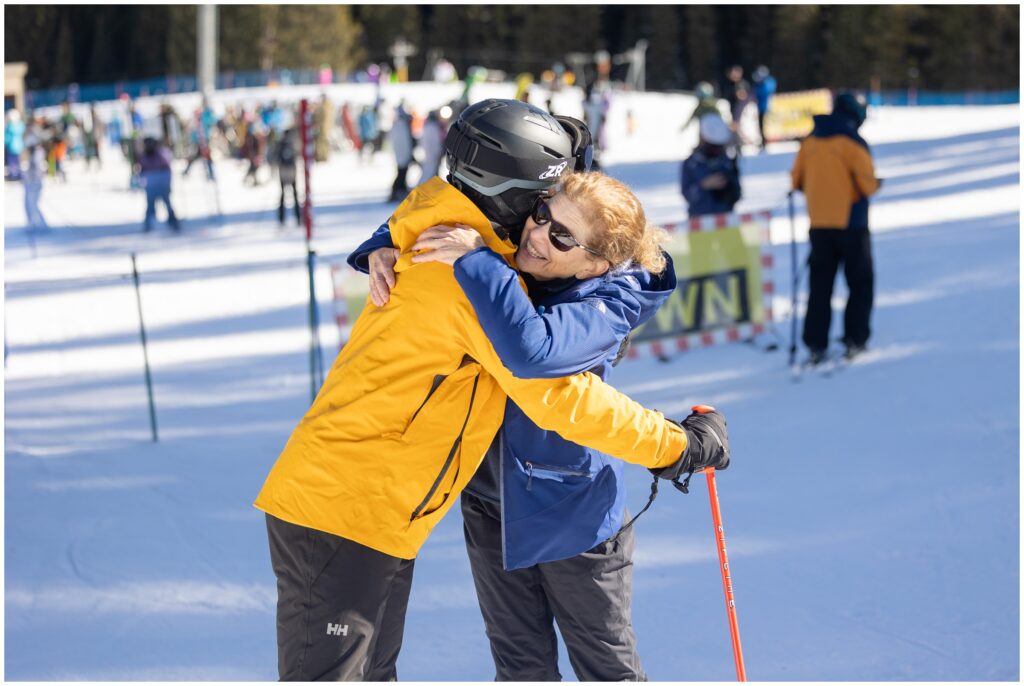 Mom celebrates with son after Breckenridge mountain ski proposal