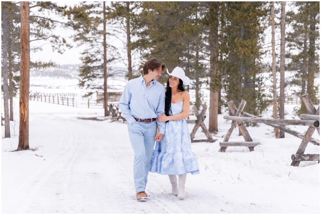 Couple walking towards camera on trail at Devil's Thumb Ranch