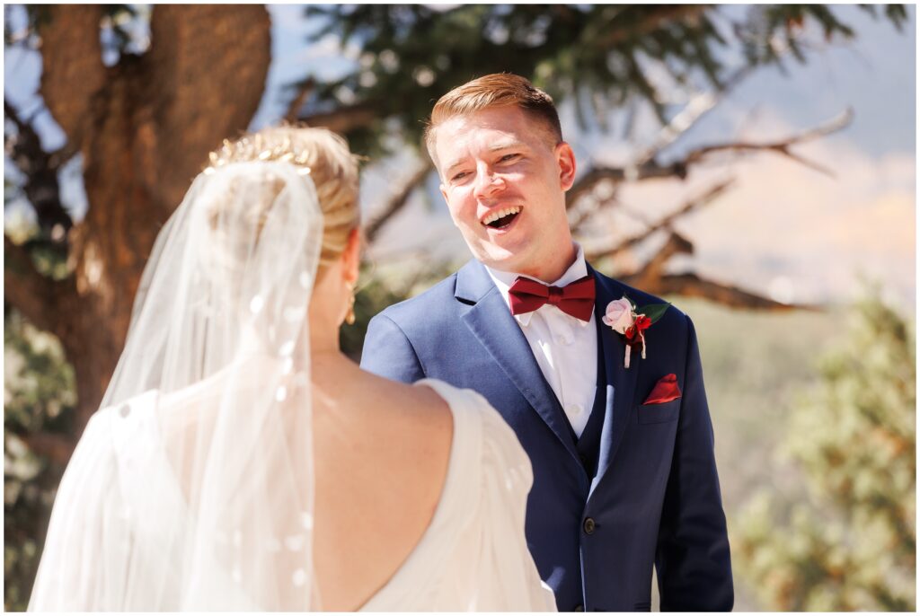 Groom seeing bride for first time during first look