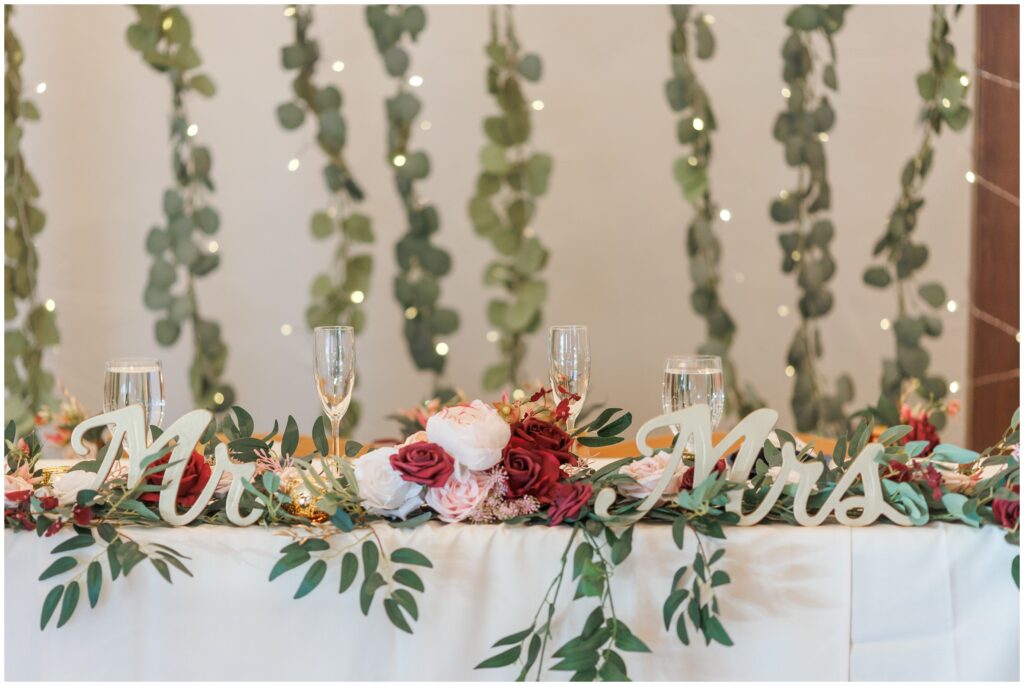 Floral decor on bride and groom's table