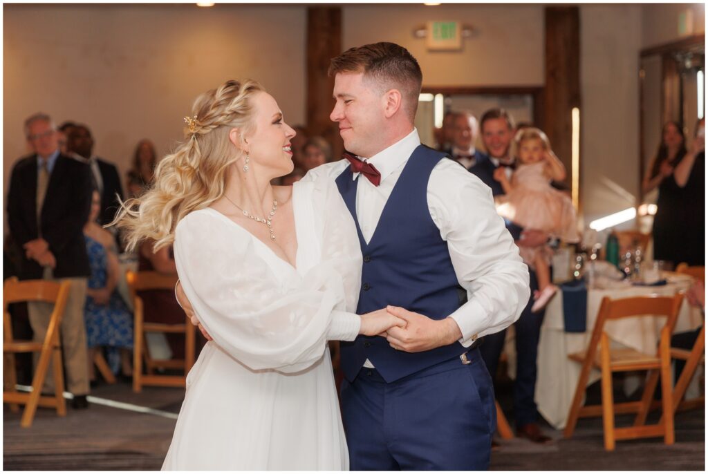 Bride and groom begin first dance