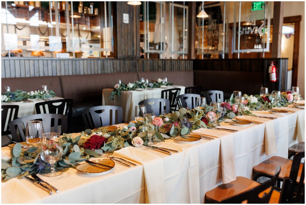 Tables decorated by Petal and Bean in reception room at Sevens at Peak 7 in Breckenridge