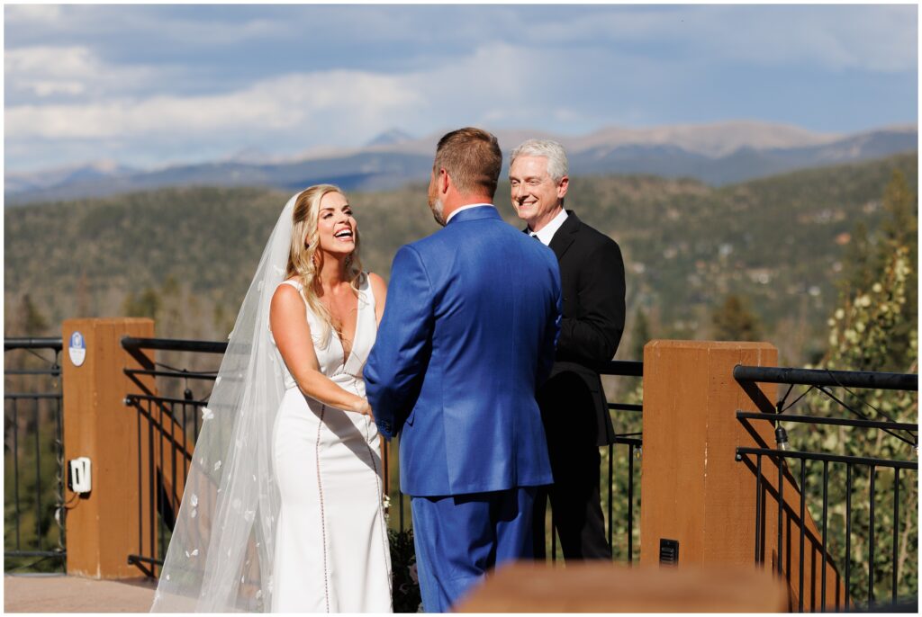 Bride and officiant smiling 