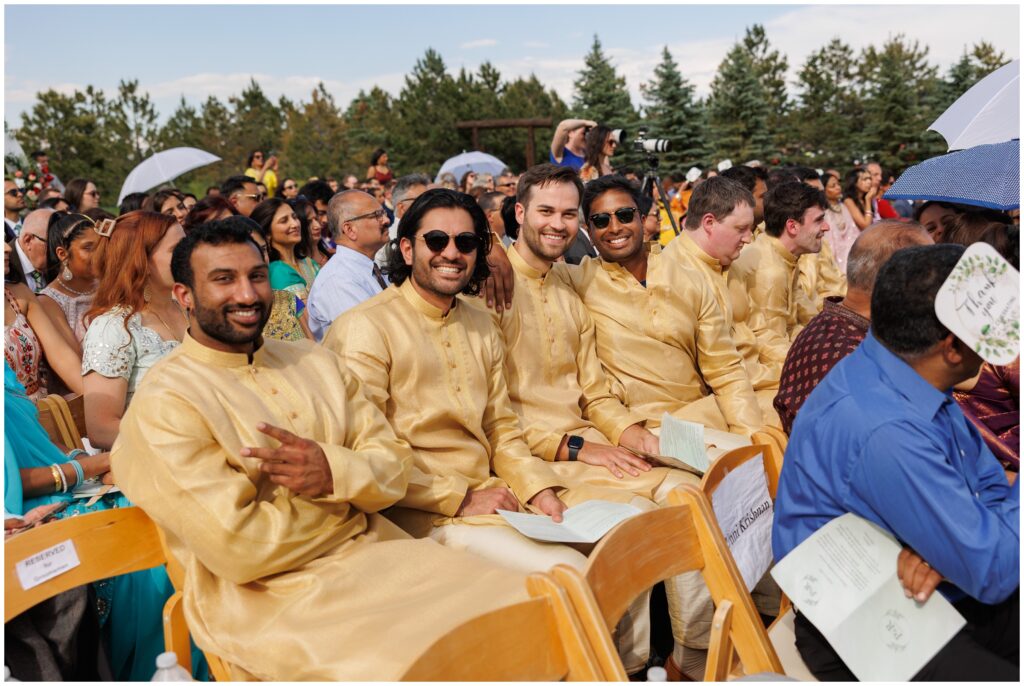 Guests smiling during ceremony 