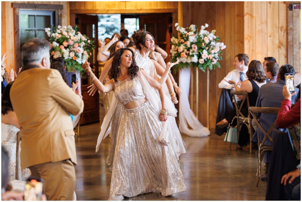 Bridal party making grand entrance at Spruce Mountain