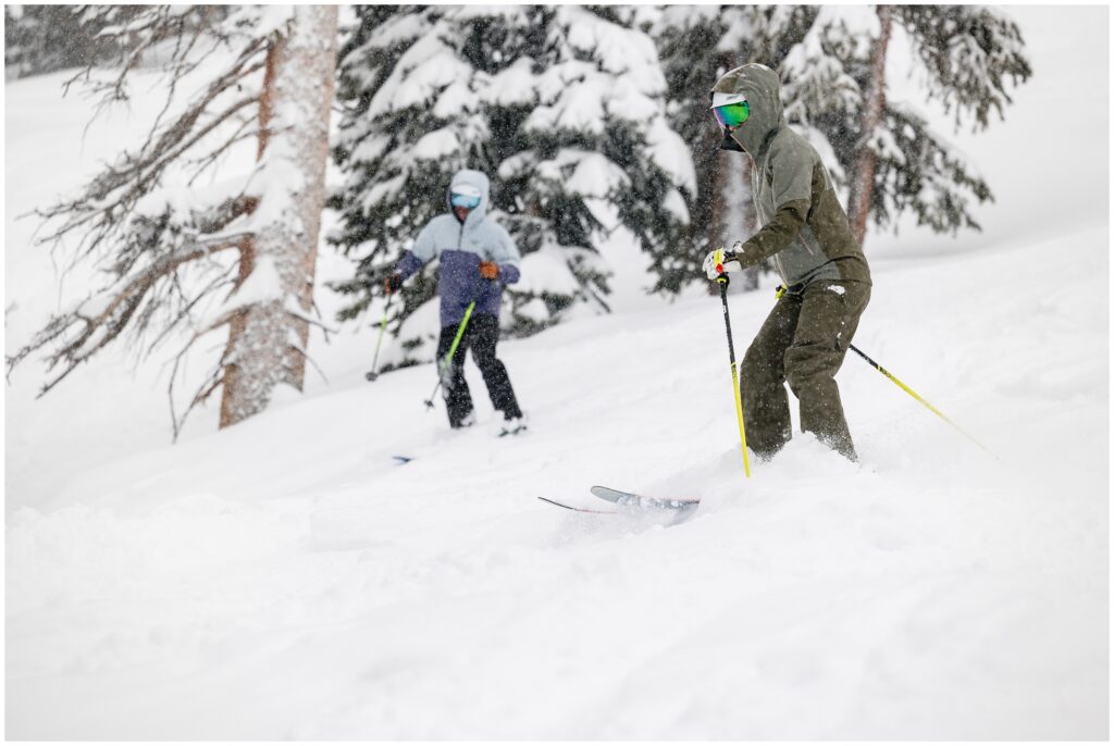 Couple skiing down Beaver Creek mountain 