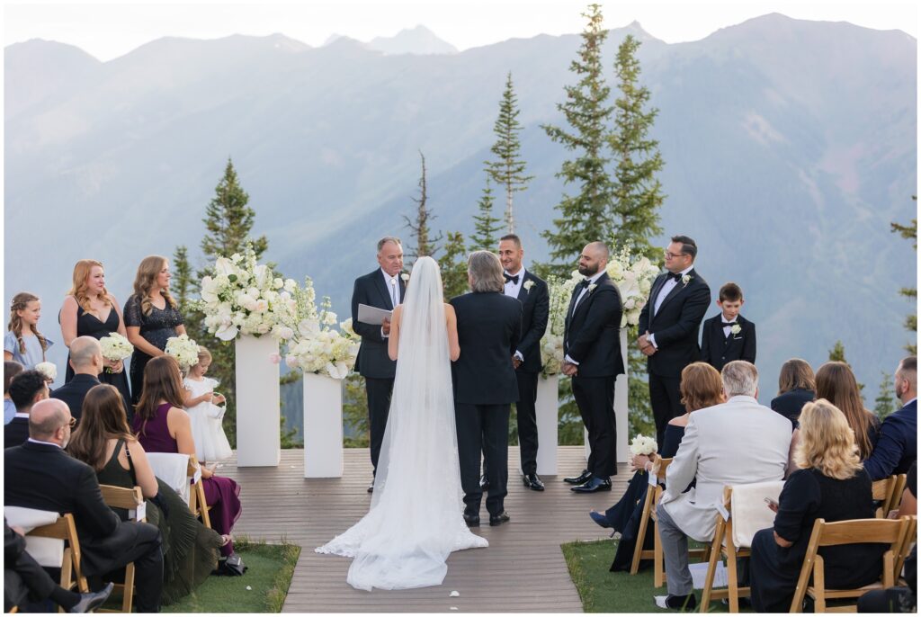 Bride at ceremony spot after being walked down