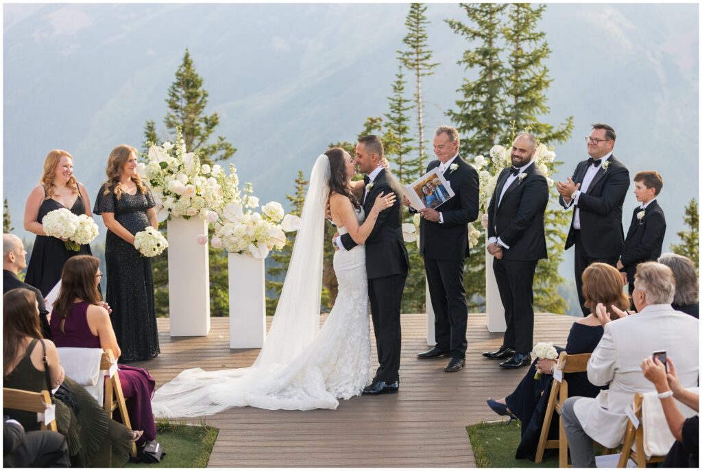 Bride and groom kiss at end of ceremony