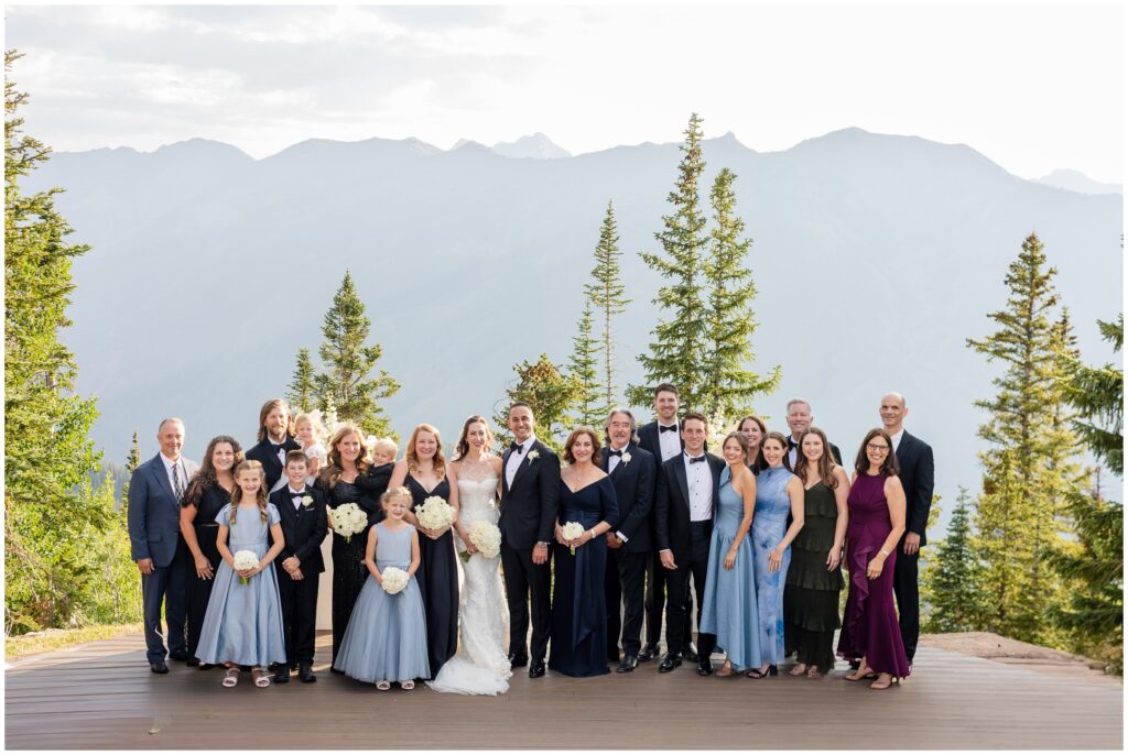 group photo of bride groom and family friends