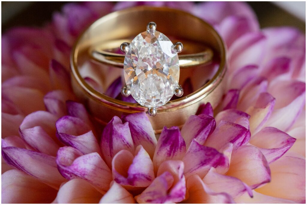 Wedding ring on purple flower