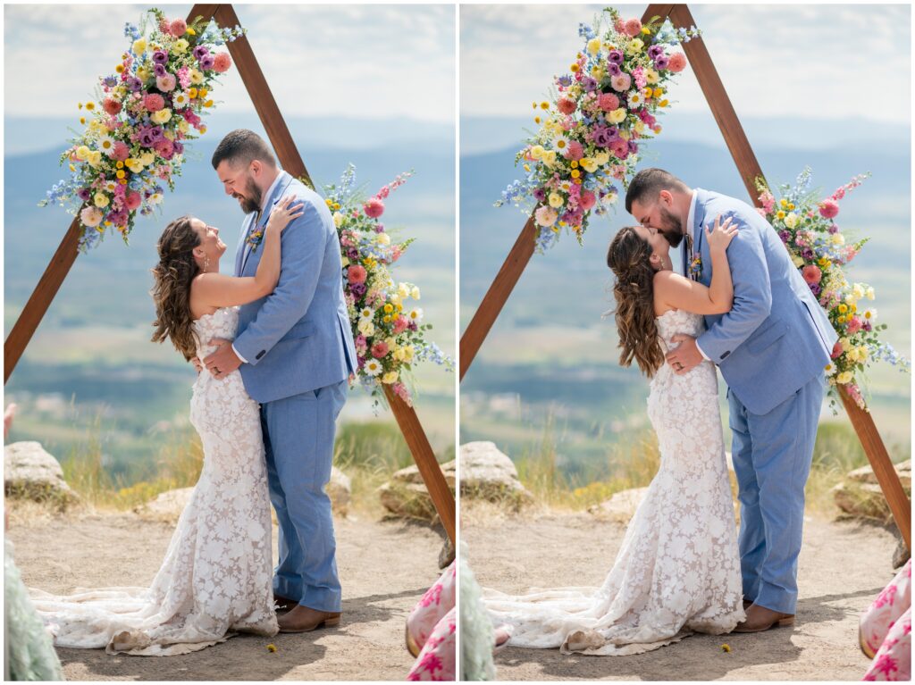 Bride and groom kissing at end of wedding ceremony at Steamboat mountain