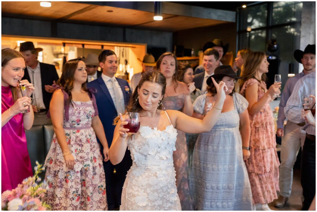 Bride dancing with guests at Table 79 in Steamboat Springs