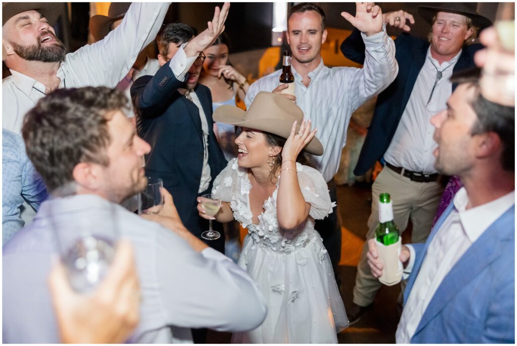 Bride dancing with guests during open dancing at Table 79 in Steamboat Springs