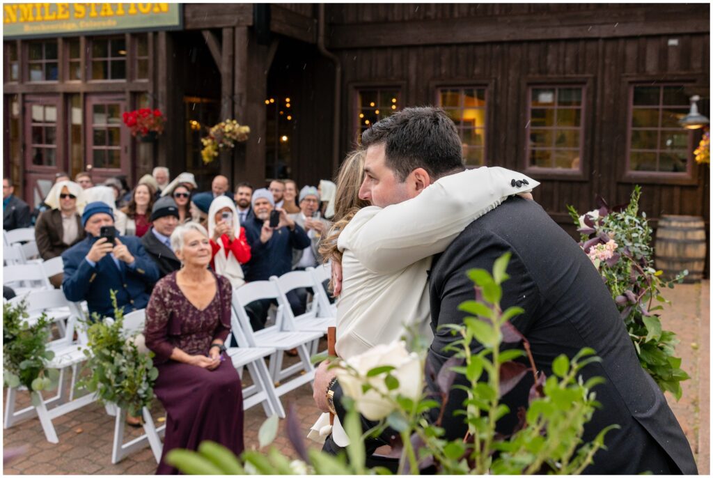 bride hugging before ceremony at at ten mile station