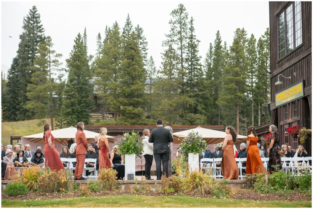 view of wedding ceremony at at ten mile station from behind