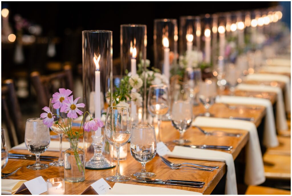 Candles lined up on reception table at at ten mile station