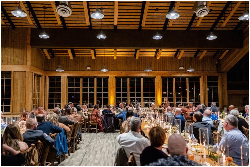 guests listening to speeches during reception at ten mile station